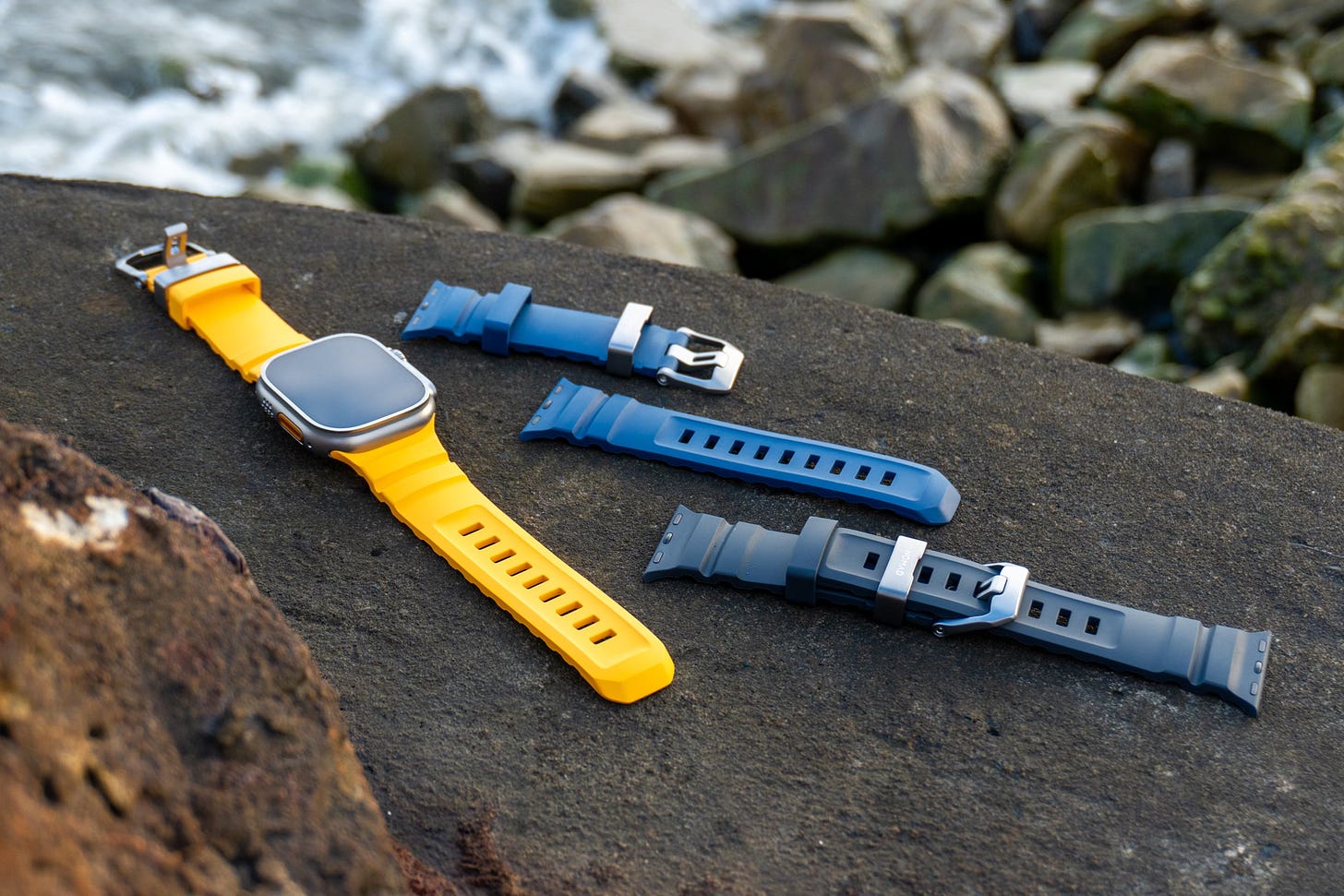 Nomad Rocky Point band for the Apple Watch Ultra in Soli, Atlantic Blue, and Storm.