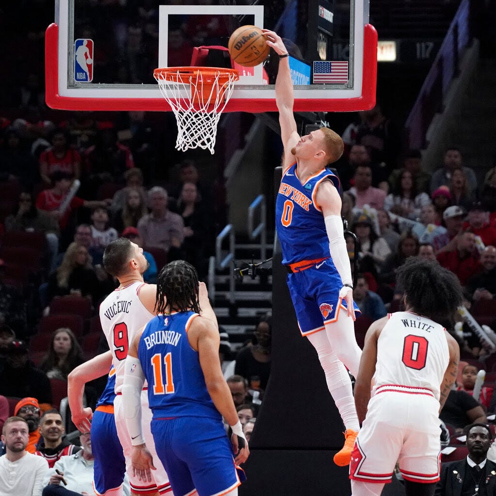 Donte DiVincenzo dunking against the Chicago Bulls.