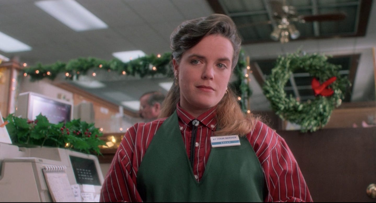 A screen grab of Sally at the Check Out from Home Alone.