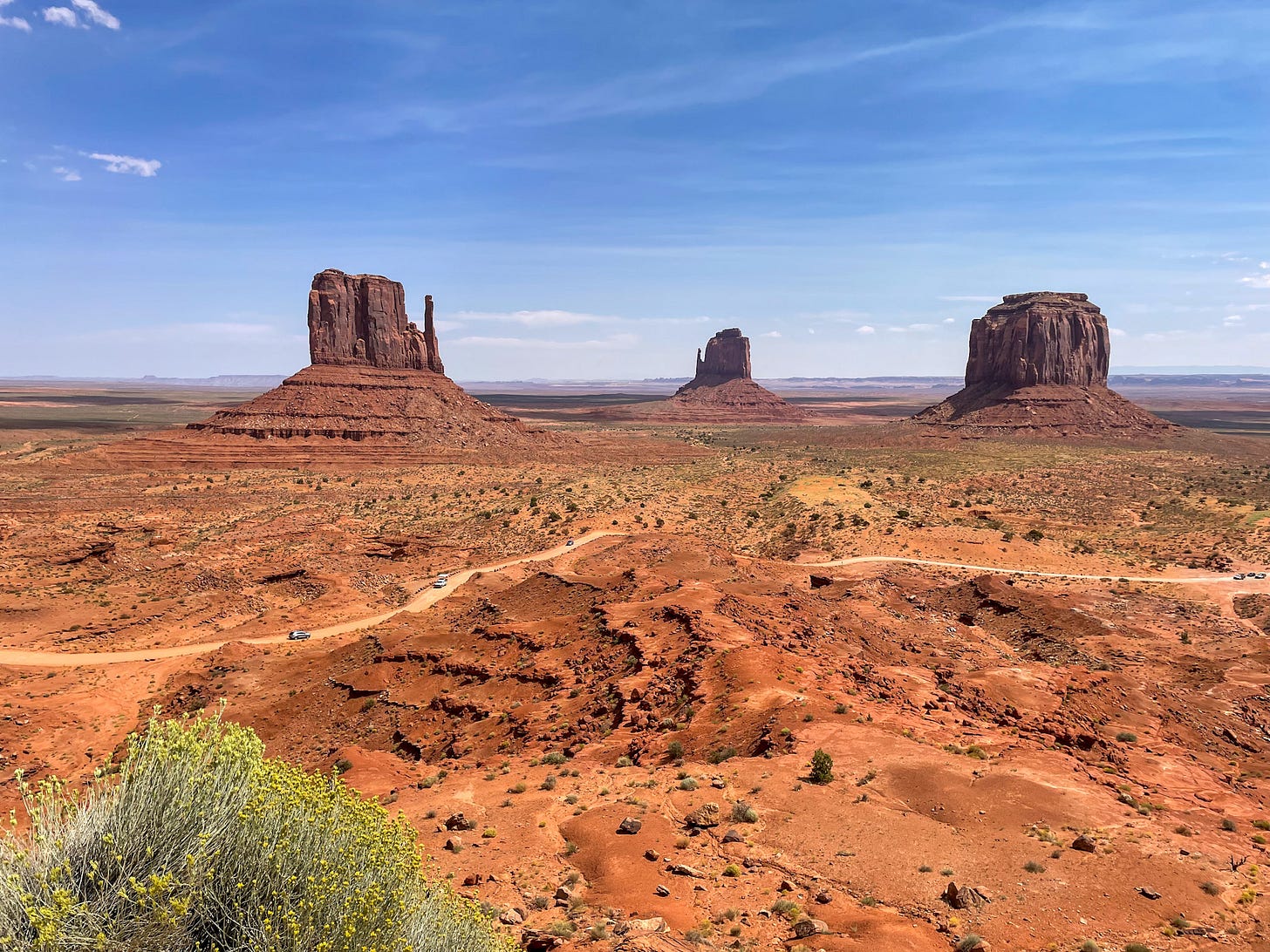 The most famous view of Monument Valley, with the East and West Mittens and Merrick Butte.