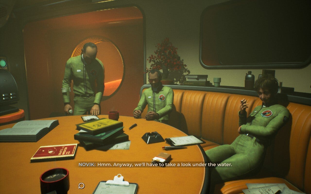 Three people sit in a 50s style spaceship around a table