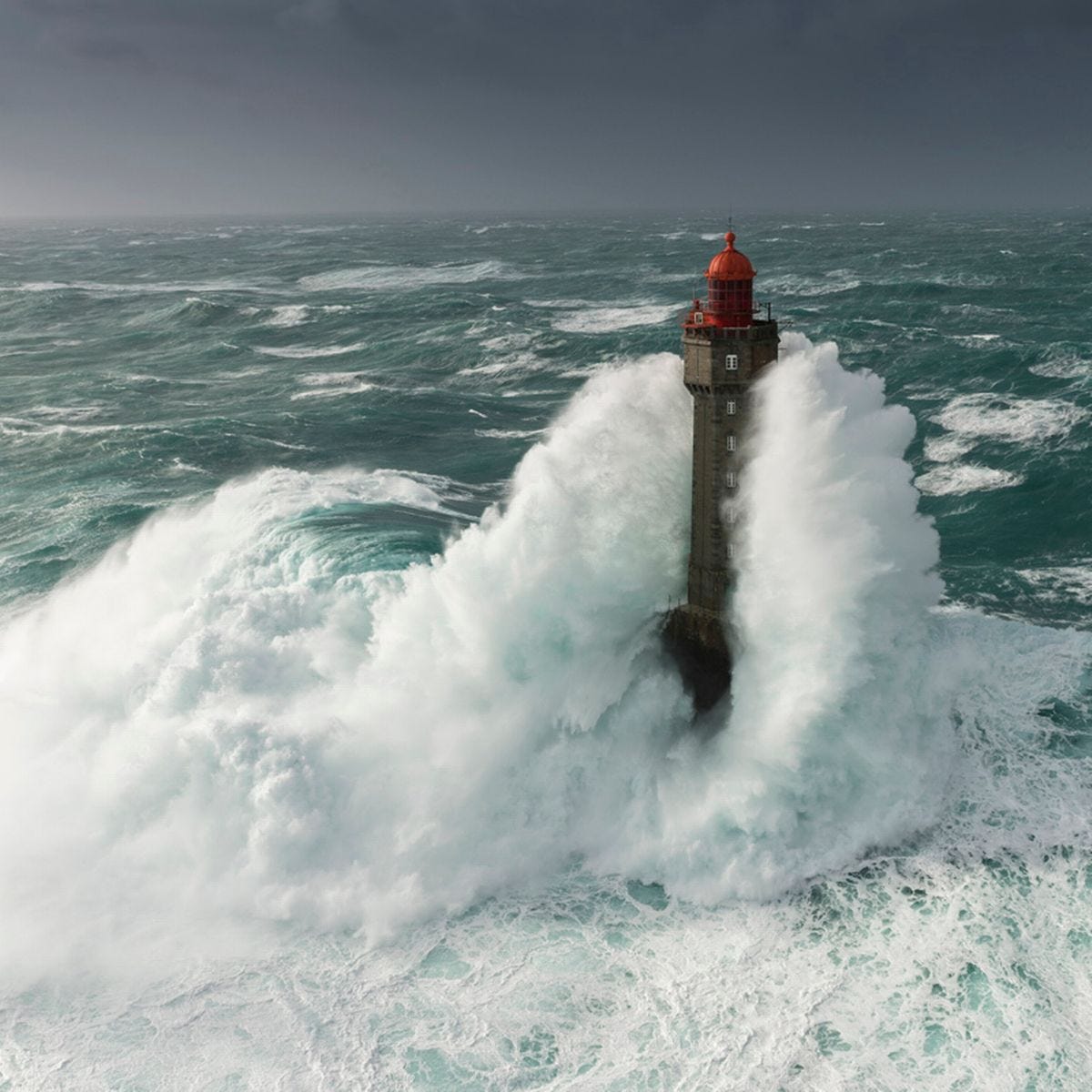Dramatic photos as massive waves completely engulf lighthouse in huge  storms - World News - Mirror Online