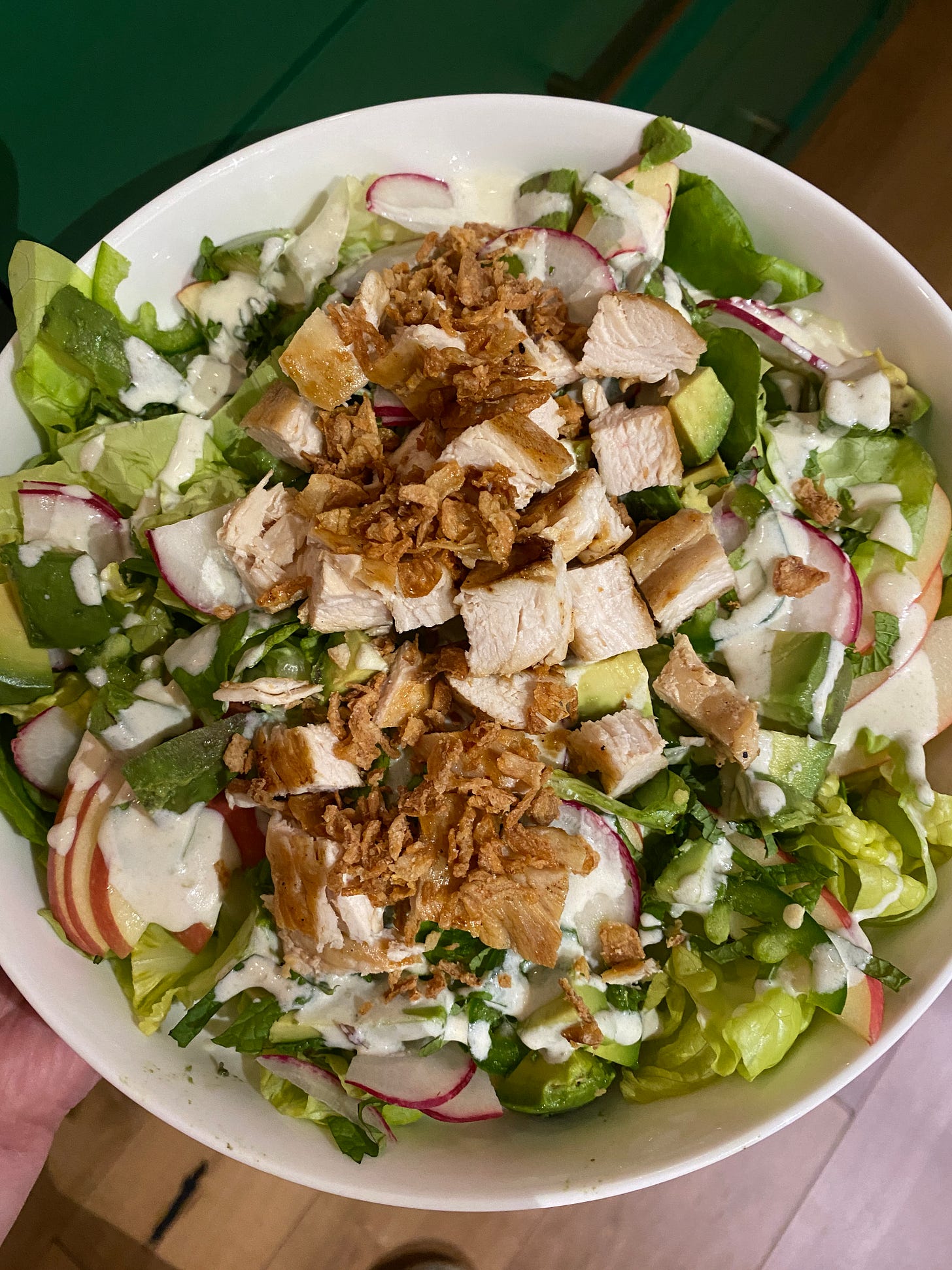 salad with chicken, apples, and radishes