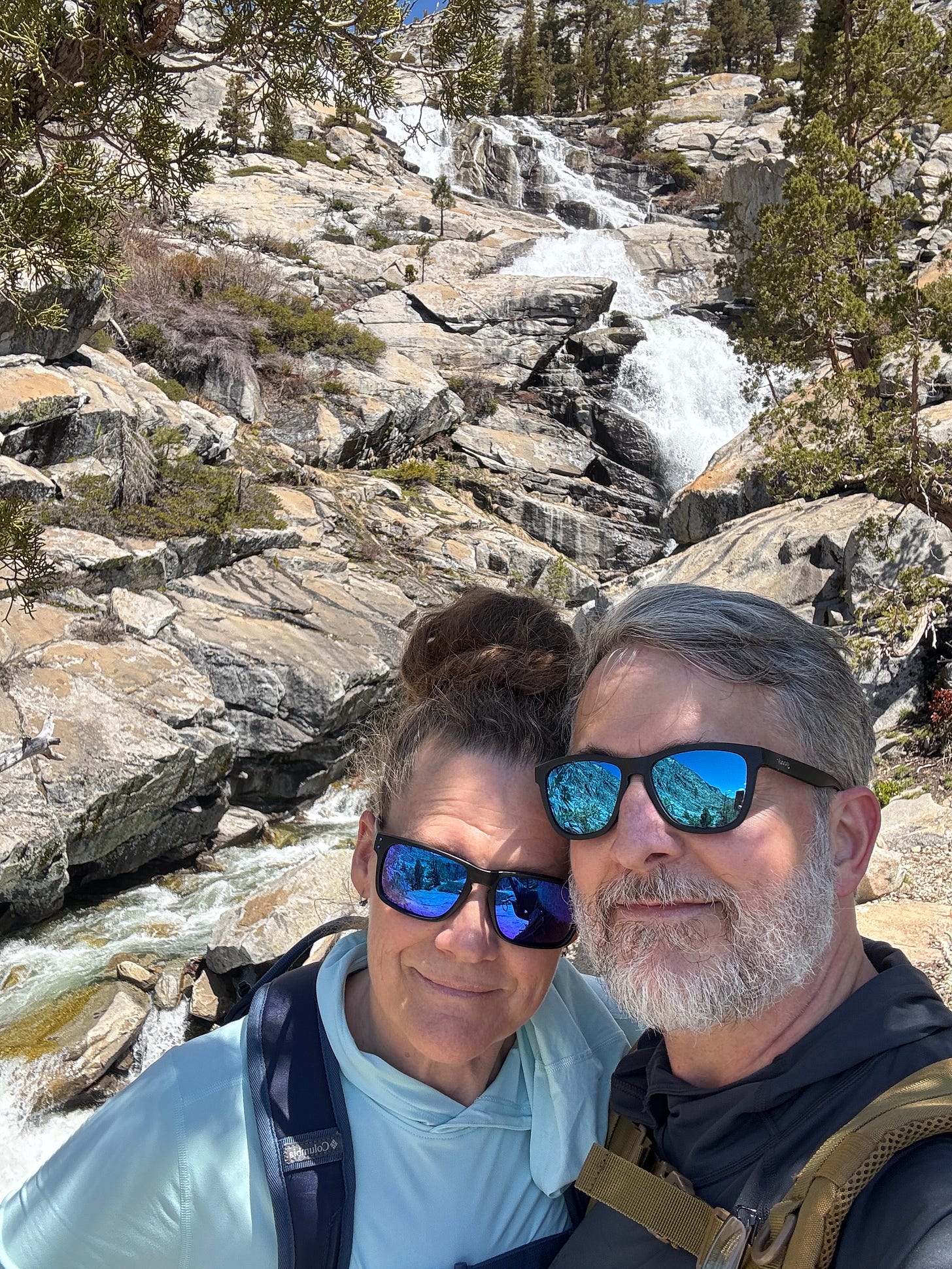 My wife and I at a waterfall