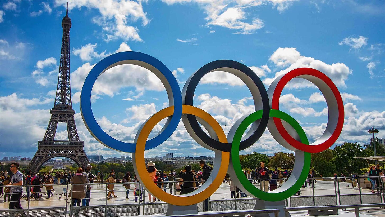 Olympic rings in front of the Eiffel Tower in Paris, France.