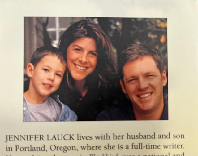Image from the back of Still Waters of author with husband Steve and son, Spencer