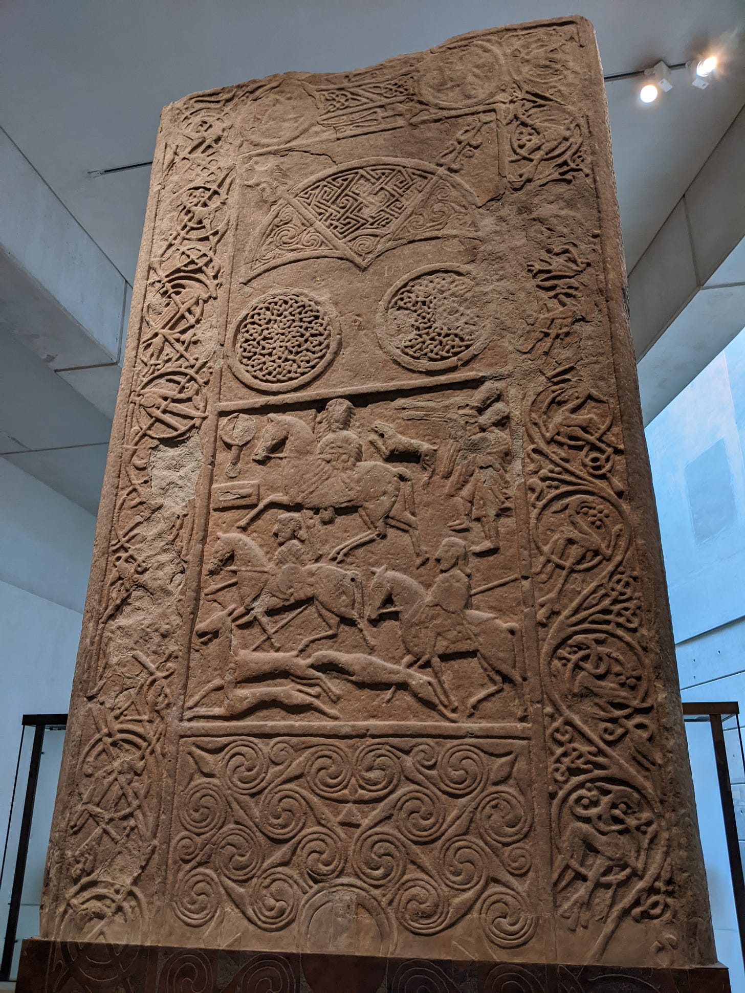 The massive Hilton of Cadboll Pictish symbol stone in a museum