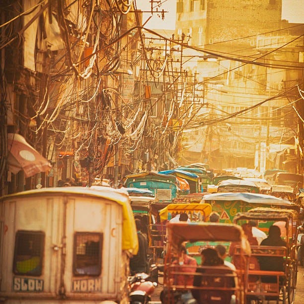Sunset Street in Old Delhi, India stock photo