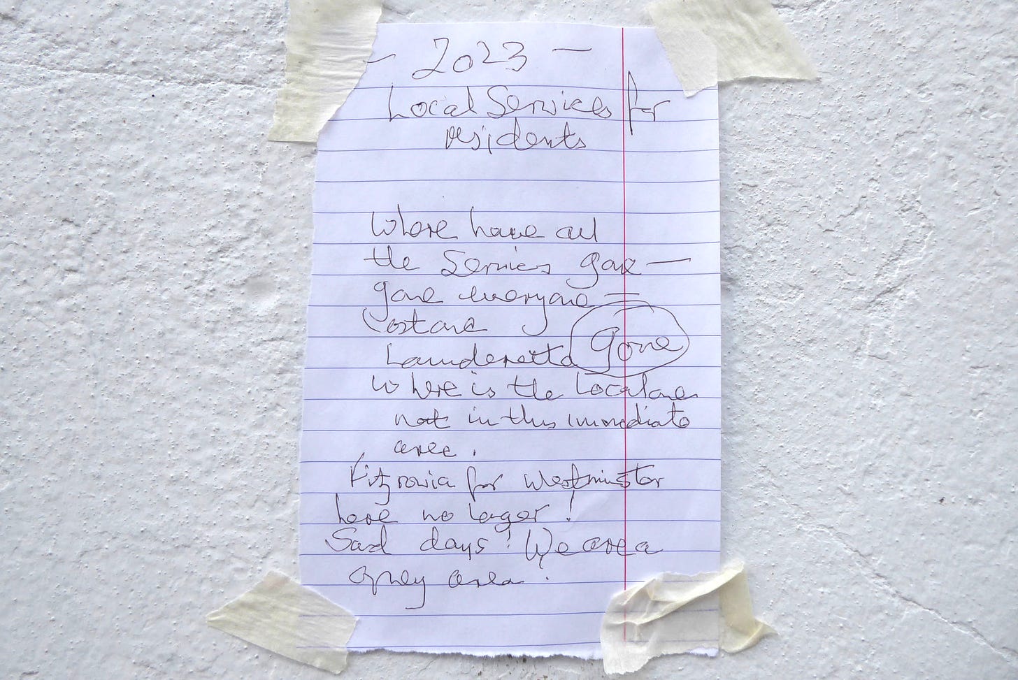 Handwriten note taped to a wall asks where have all the local services gone.