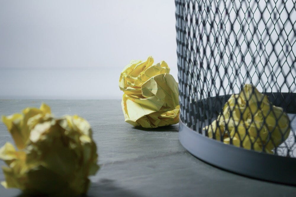 Wastebasket with crumpled papers (Credit: Steve Johnson / Unsplash)