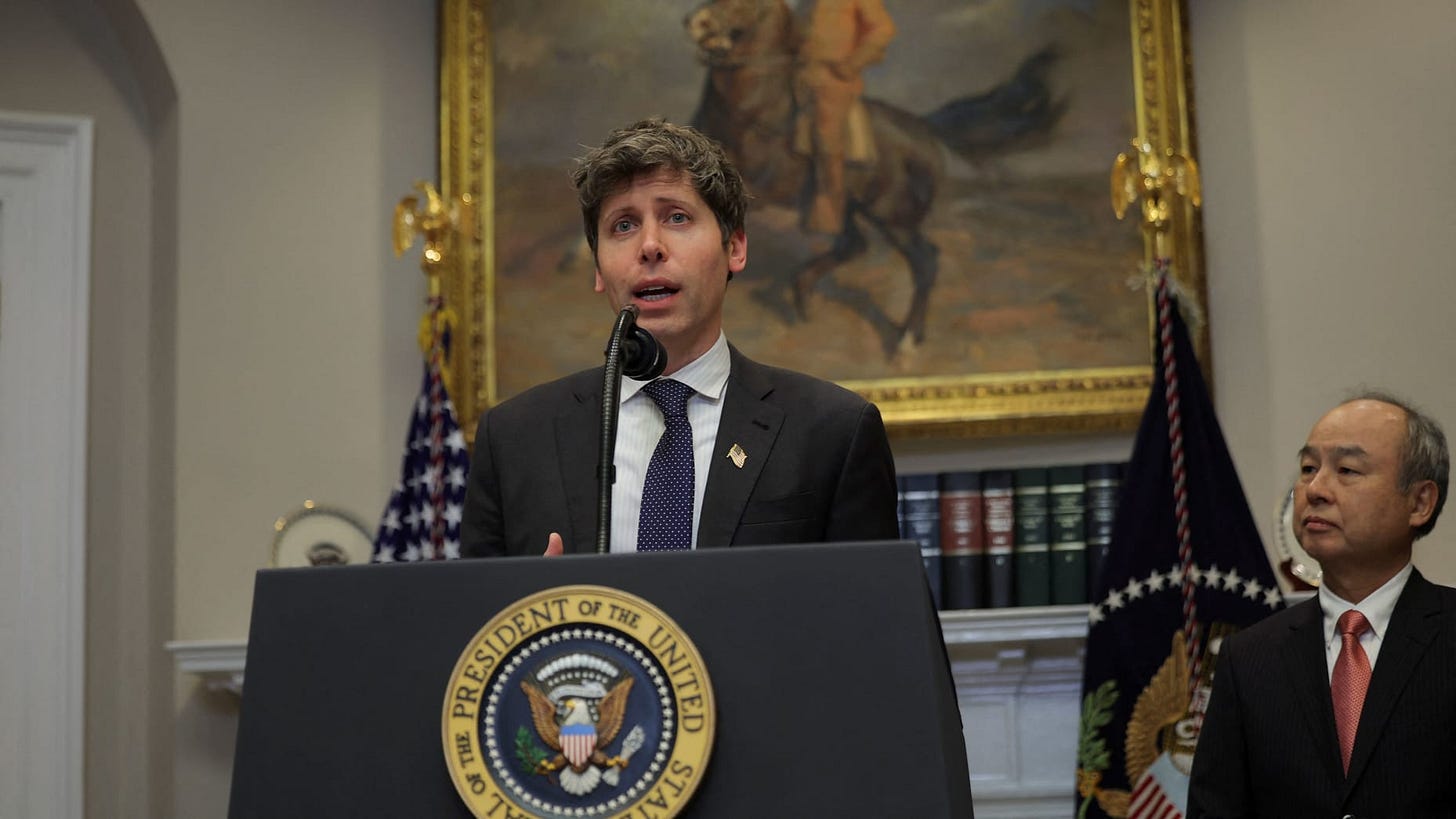 OpenAI CEO Sam Altman speaks next to SoftBank CEO Masayoshi Son after U.S. President Donald Trump delivered remarks on AI infrastructure at the Roosevelt room at White House in Washington, U.S., January 21, 2025.  REUTERS/Carlos Barria