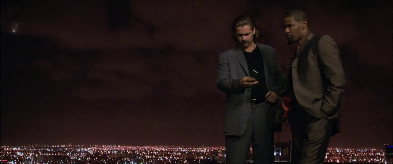 A person standing on a rooftop

Description automatically generated