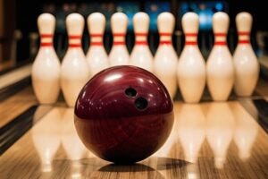 Bowling ball and pins