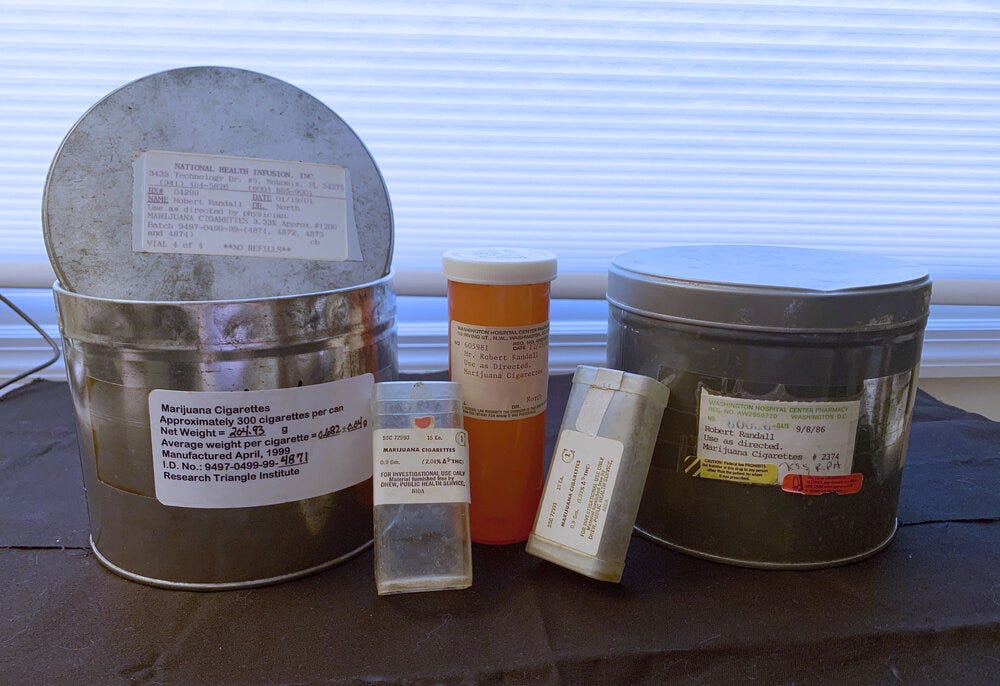 Various containers in which Robert's marijuana was delivered through the years. The clear plastic cases were first, followed by the brown prescription bottles and then the iconic canister.