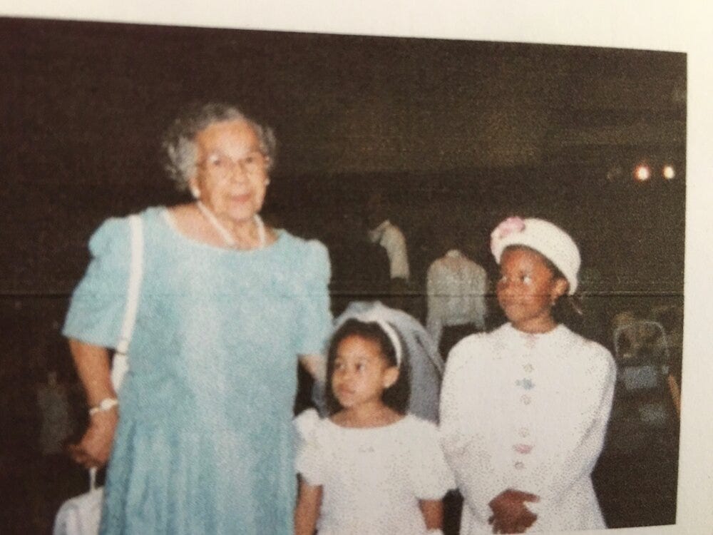 (L to R) Mama Helen, me, and my late cousin Christian in 1997 at my sister’s wedding from a bound book my father made for me filled with family pictures and his arguments that African religions are paganism and Jehovah’s Witnesses have the only true…