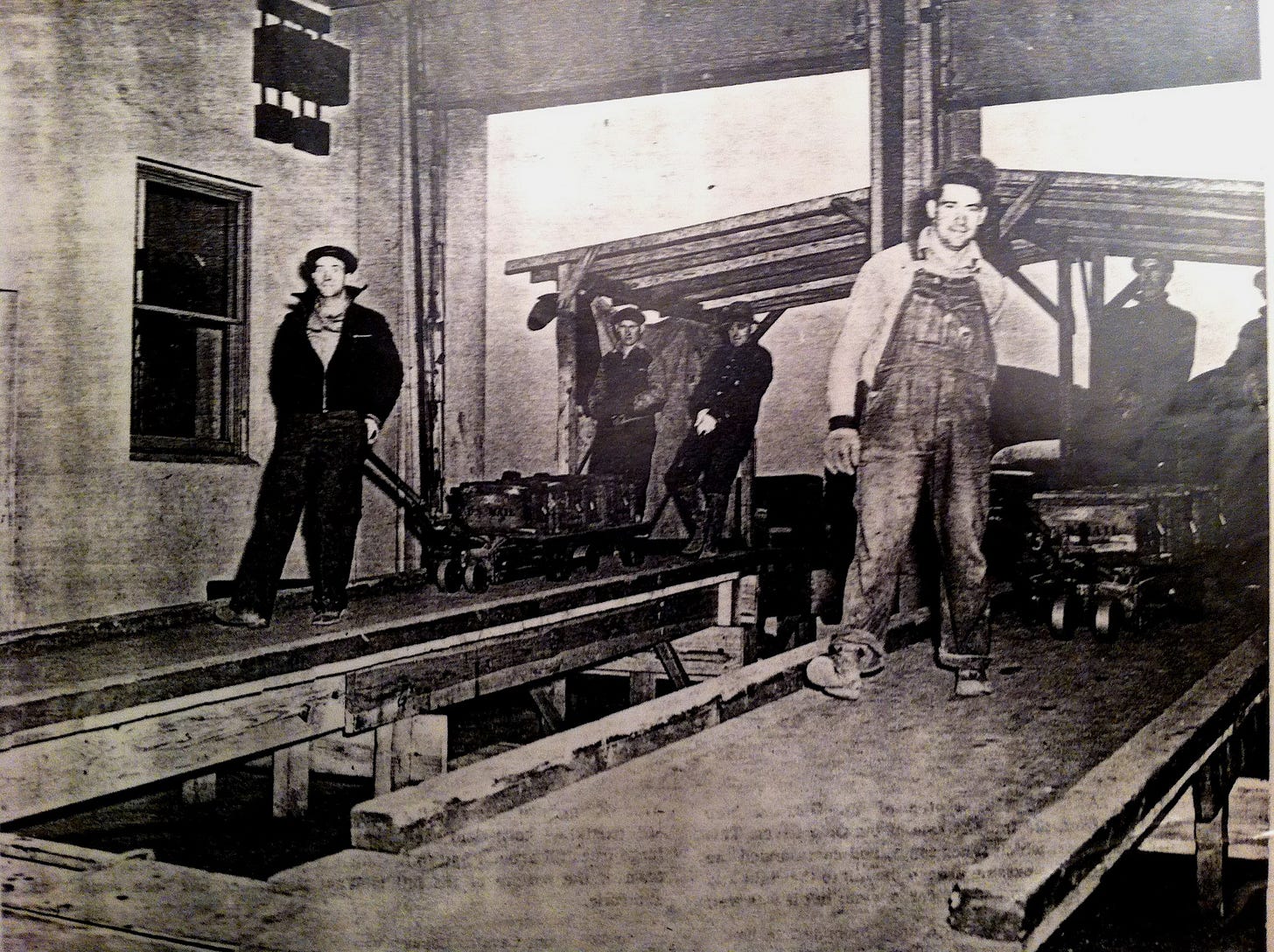 Photo of Perry and Alton Padgett working in the Gold Vault Photo of Perry and Alton Padgett working in the Gold Vault