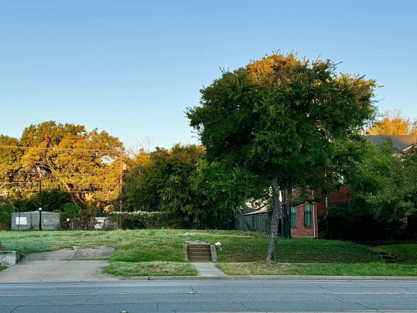 Empty lot with old concrete stairs