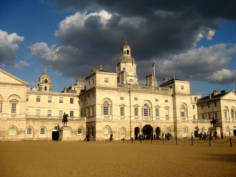 Horse Guards in London with a dark cloudy background