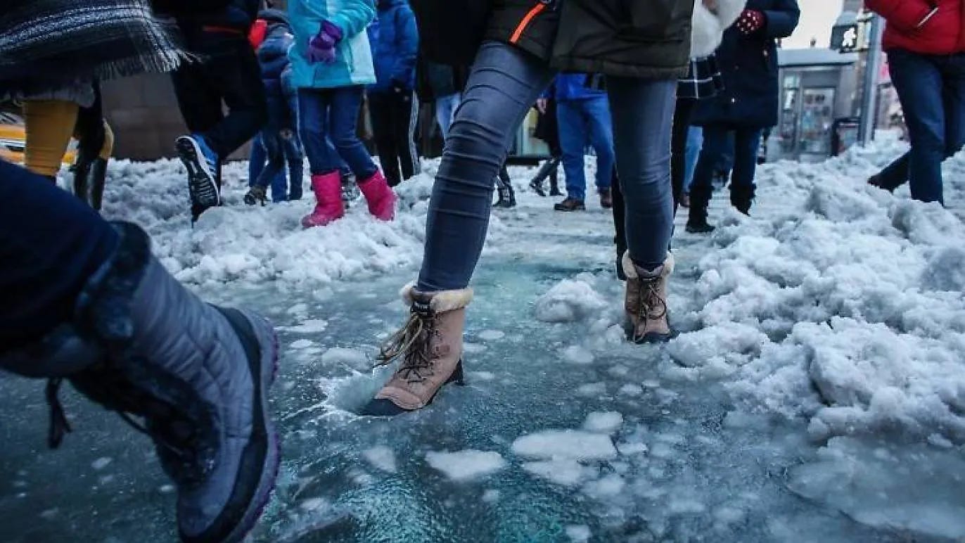 Boots stepping in slush, lifted from a place called BootRescue.