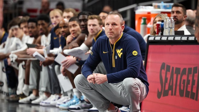 A look at Darian DeVries' West Virginia basketball contract buyout
