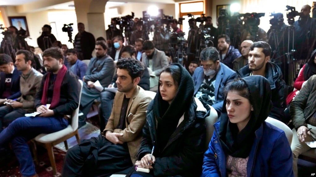 FILE - Afghan journalists attend a press conference in Kabul, Afghanistan, Feb. 13, 2022. The Taliban, Afghanistan's de facto authorities, have submitted a draft of a new media law for their supreme leader to consider. 
