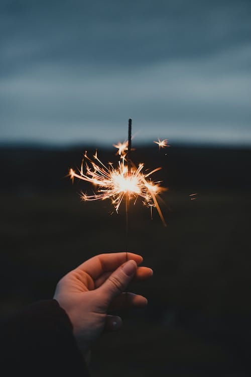 Free Hand Holding Sparklers Stock Photo