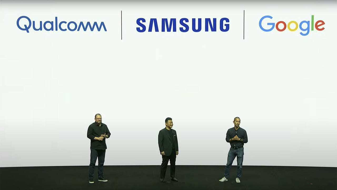 Executives from Qualcomm, Samsung, and Google on a stage under their respective company logos