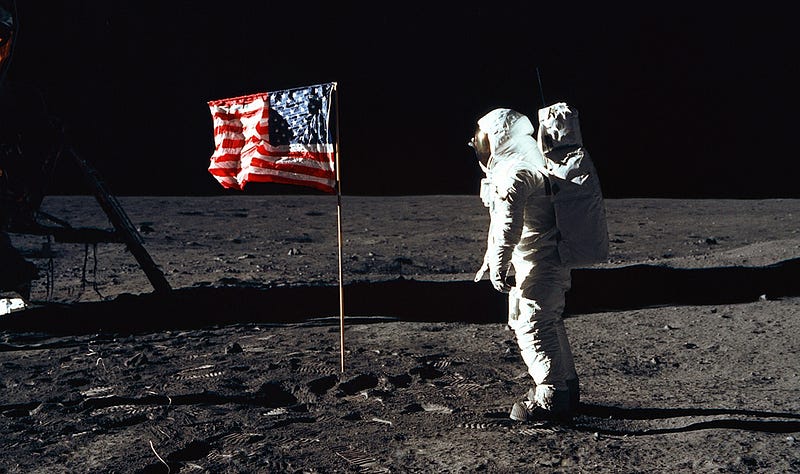 Astronaut on the moon and the American flag