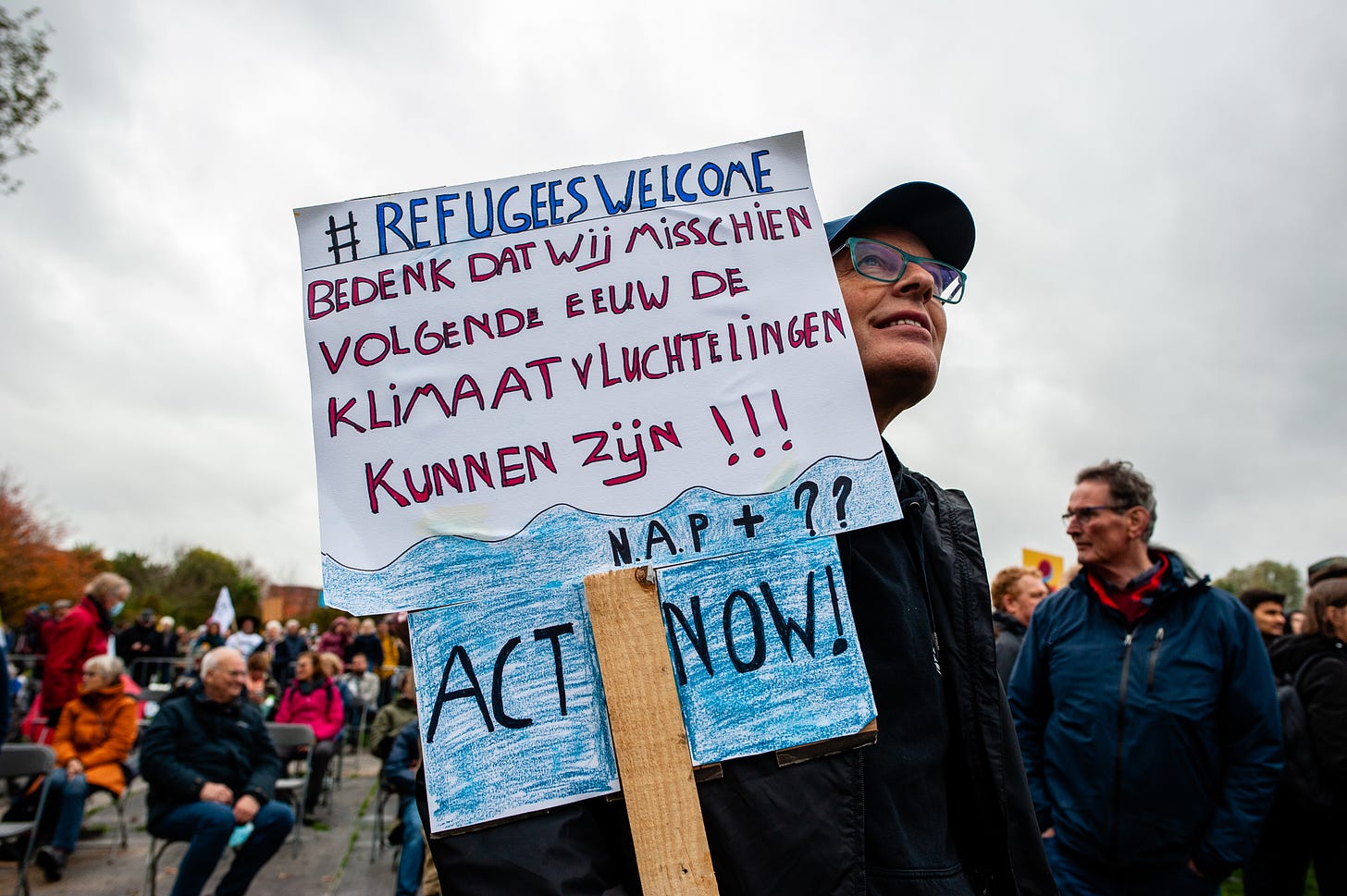 A pro-refugee protester during a demonstration organized by the Dutch Climate Crisis Coalition in 2021. (Photo by Ana Fernandez/SOPA Images/LightRocket via Getty Images.)