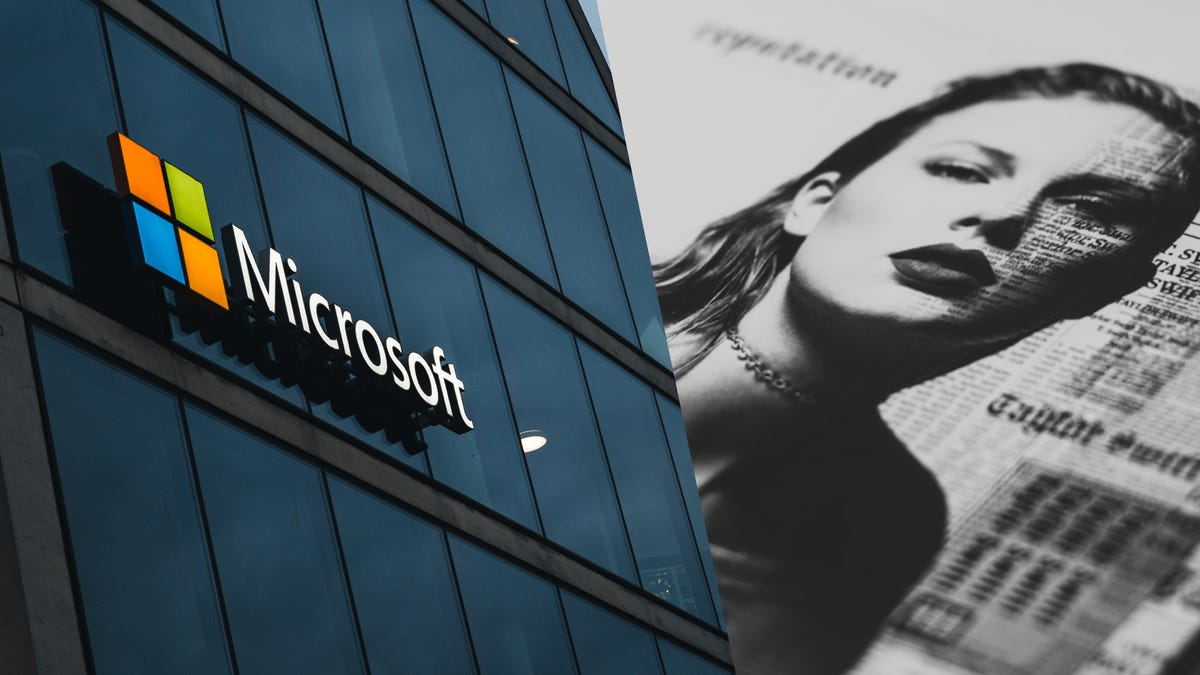  Microsoft logo on a building next to the Taylor Swift Reputation album
