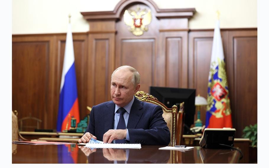 Russian President Vladimir Putin attends a meeting at the Kremlin in Moscow, Russia, on Thursday, Dec. 28, 2023. 