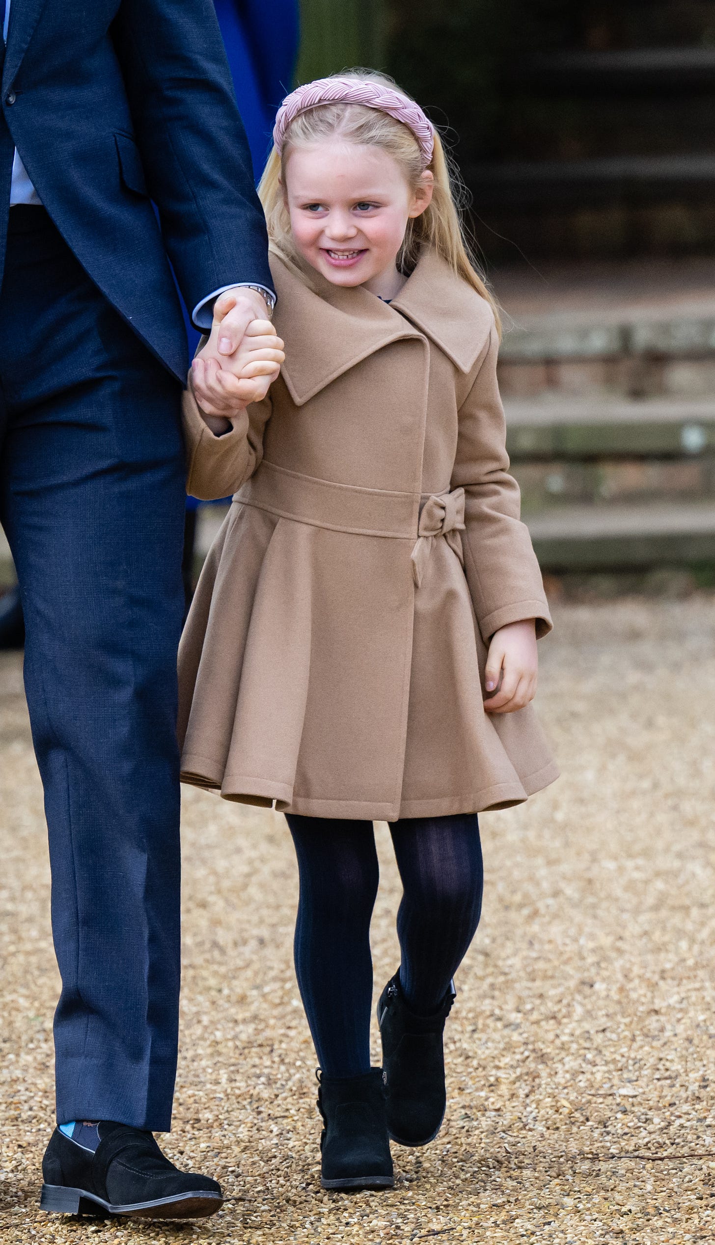 Lena Tindall holding Mike Tindall's hand on Christmas Day