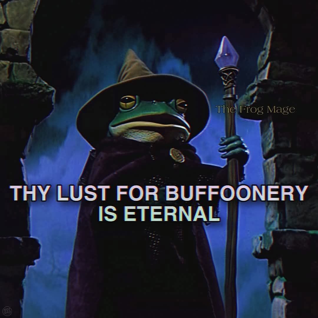 A frog dressed in wizard gear holding a magical staff with a purple crystal stands in a gothic background. Caption: Thy lust for buffoonery is eternal