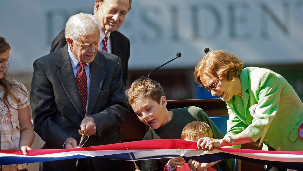 Hugo Wentzel is the grandson of former U.S. president Jimmy Carter. A young Wentzel and Carter's great-grandson Henry Carter, second from right, cut a ribbon with the help of Rosalynn Carter at Atlanta's Carter Presidential Museum in 2009.