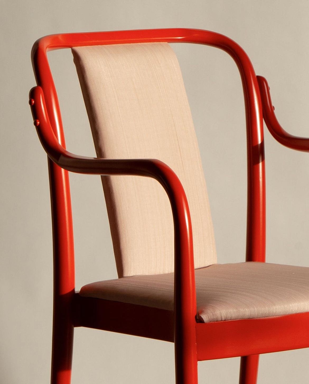 A red chair by Beata Heuman.