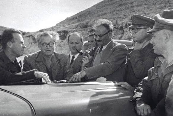 Yosef Weitz (center right), "the Architect of Transfer," with Yitzhak Rabin and Haim Laskov in the Yakir forest in the Naqab area. (Photo: Wikimedia Commons)