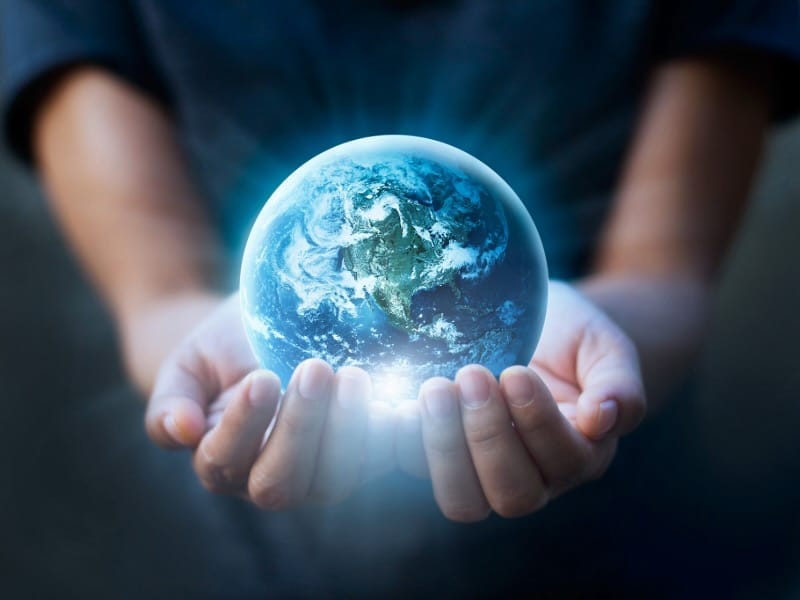Earth day, Human hands holding blue earth, save earth concept. Elements of this image furnished by NASA