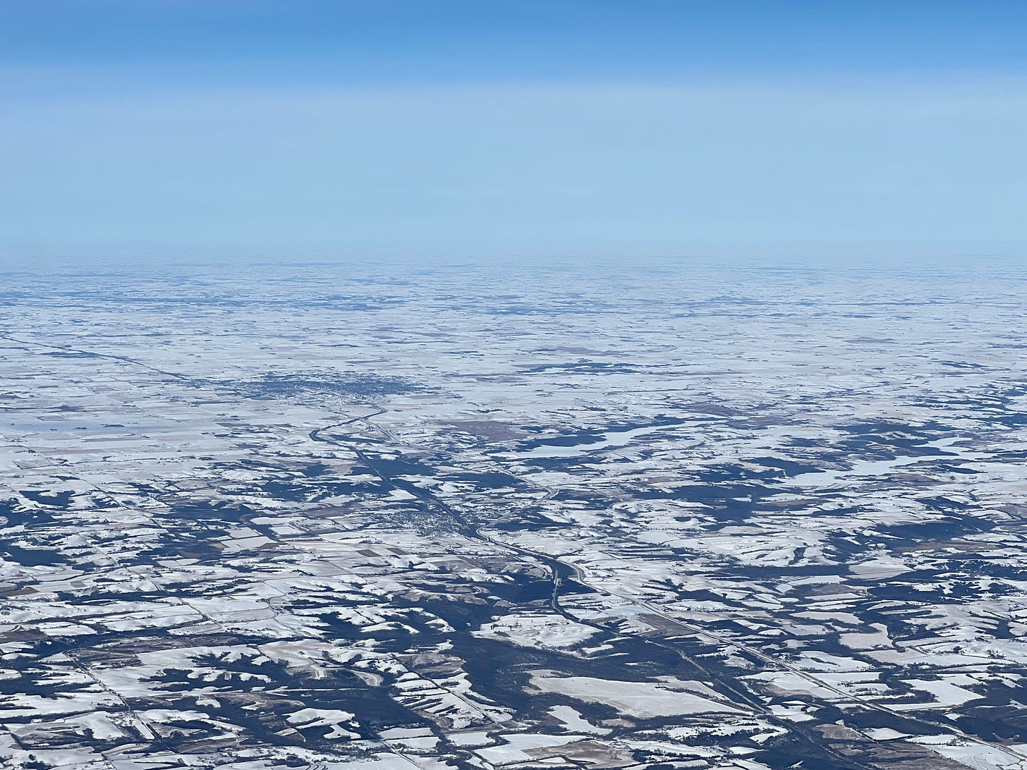 Aerial shot of Midwestern landscape covered with snow