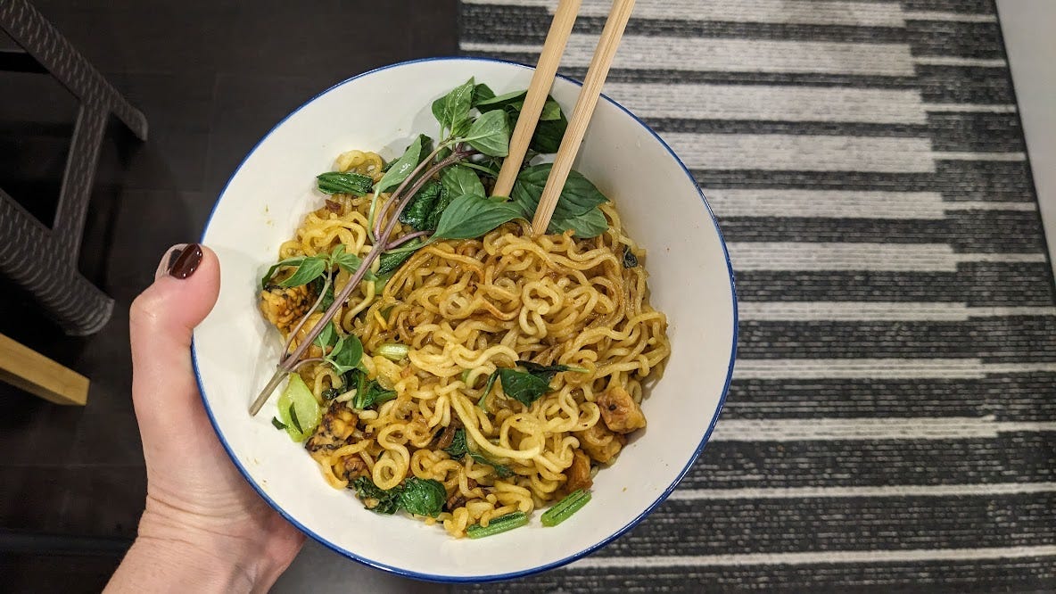 bowl of stir-fried noodles and vegetables