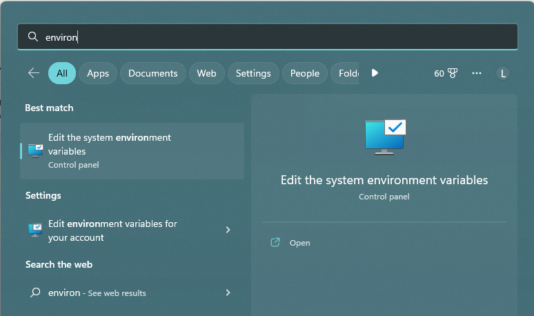 Open up the System environment variables inside the Control Panel.
