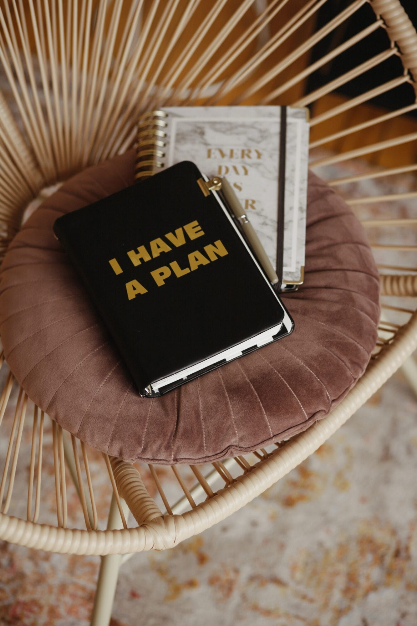 black and white book on brown and white round textile