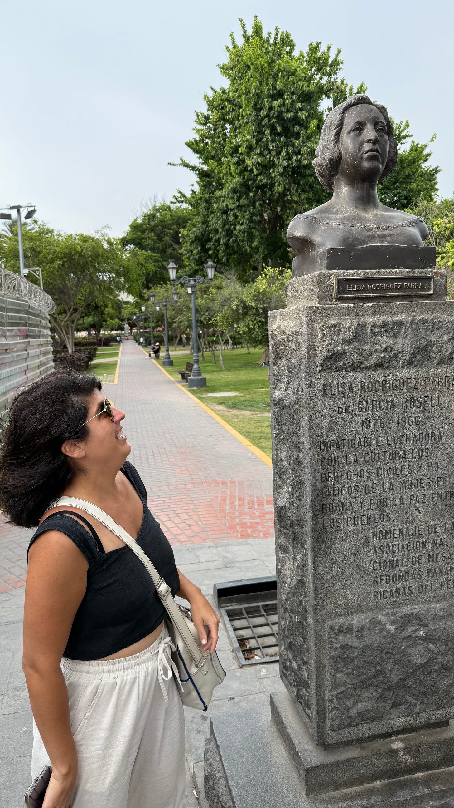 Me looking at a statue of my ancestor