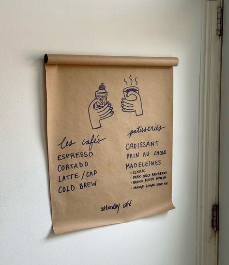 This may contain: a bulletin board with instructions on how to drink coffee