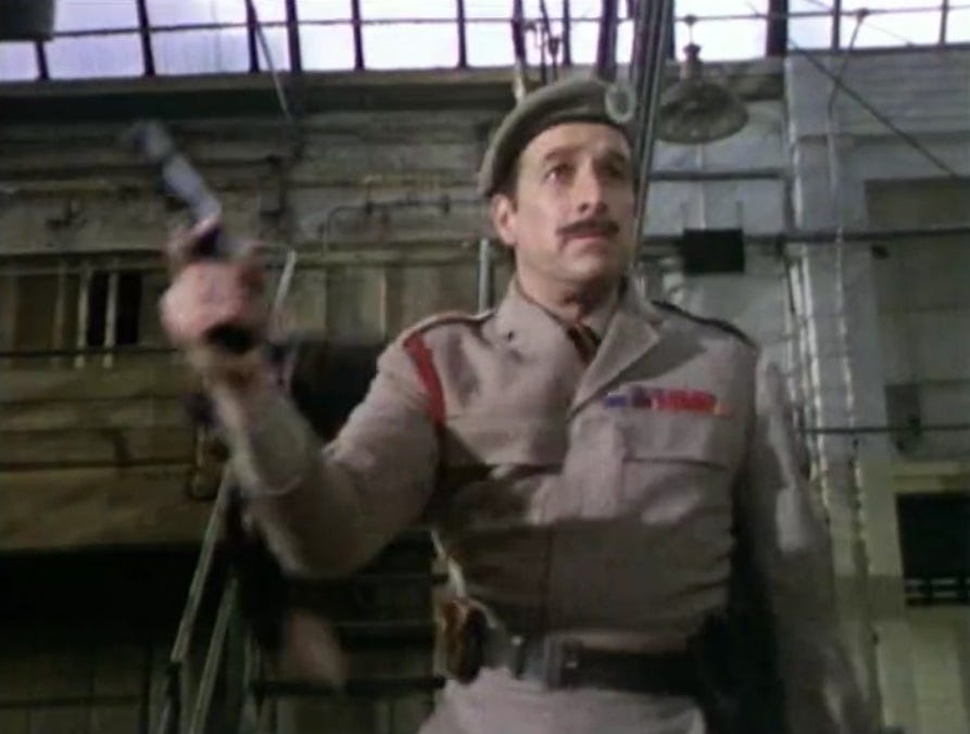 The Brigadier waving his pistol around in The Ambassadors of Death
