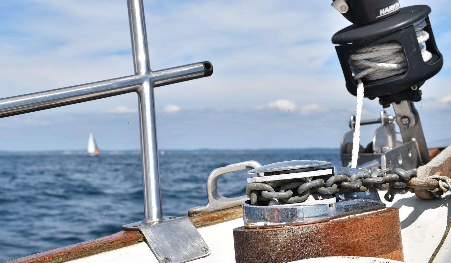 A view from the bow of a sailboat on Lake Michigan