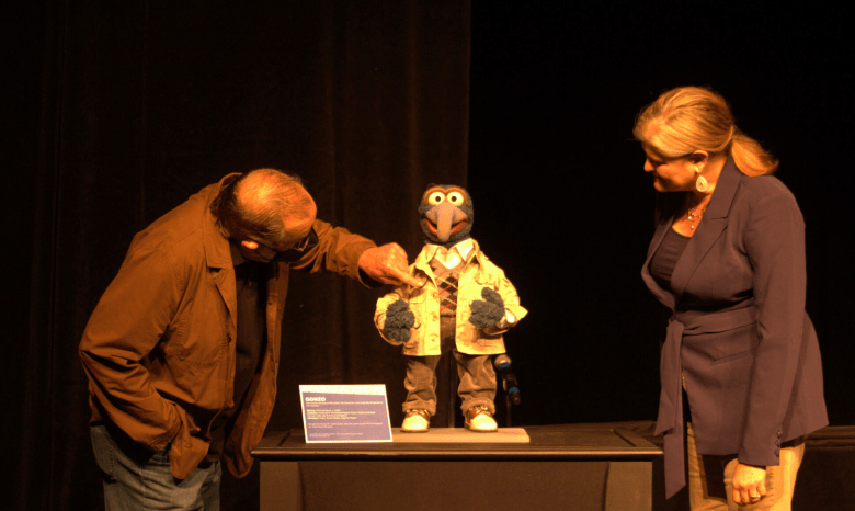 Dave Goelz (left) and moderator Center for Puppetry Arts Executive Director Beth Schiavo with Gonzo.