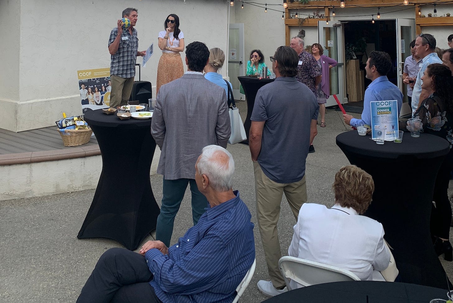 Carlsbad Chamber Community Foundation Director Chris Cochran speaks at fundraising cocktail event in July. Photo courtesy of the Carlsbad Chamber of Commerce