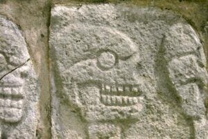 Detail from the reconstructed stone tzompantli, or skull rack, at Chichén Itzá.