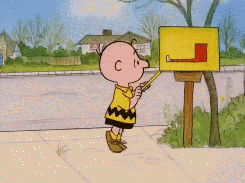 Charlie Brown opens mailbox, sees nothing, closes it, sighs sadly