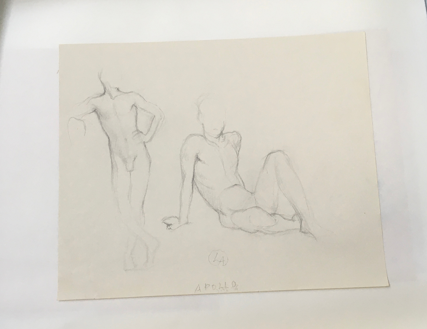 Two sketched male figures, one standing with legs crossed, hand to hip, leaning to the left, another seated in a reclining pose, labeled "Apollo."